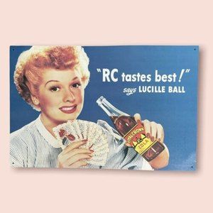 Desperate Enterprises, Inc.-“ I Love Lucy” RC Cola Blue Tin Sign 16 X 10.5